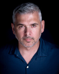 Stylish Male mid-50s Alpha key