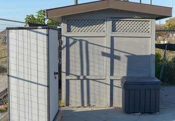 outdoor cabinet, WC, and salt bin