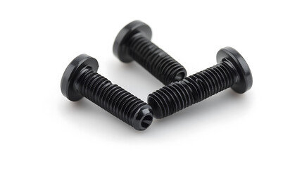 Black metal self-tapping screws isolated against a white background
