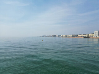 Aerial View of British Tourist Attraction of Beach and Ocean at Brighton and Hove Coastal City of...