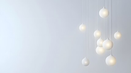 White Globe Pendant Lights Hanging from a White Ceiling
