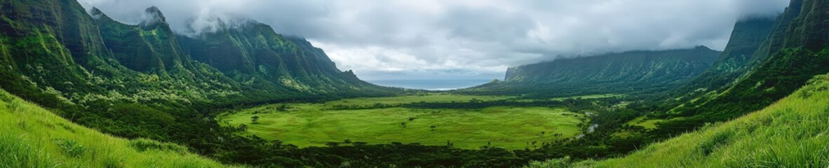 Cloud shadows over a lush mountain valley