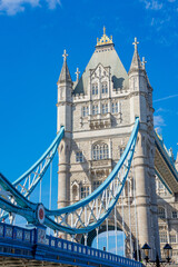 Tower Bridge under the River Thames, movement of cars and people during a sunny summer day,...