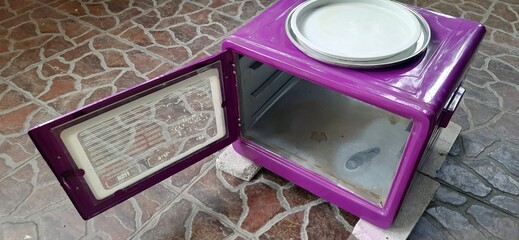  Oven cake flipper purple colors background © andi