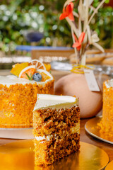 Exquisite, soft and fluffy cakes with a delicious orange cream. Cake without a slice. Gourmet pastries. Hotel restaurant.