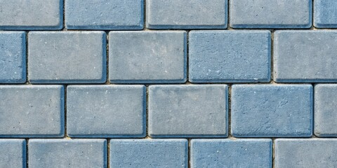 Fototapeta premium Gray-blue concrete paving stones with a smooth finish , Paving stones, concrete, gray-blue, sidewalk, pathway, construction