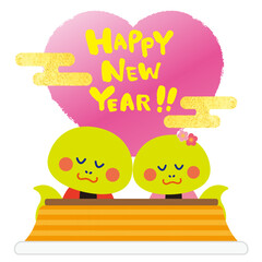 新年の挨拶をするコタツで温まるヘビのカップル