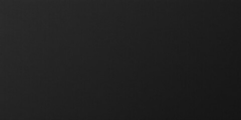 Fototapeta premium Close-up shot of a textured black paper sheet, design, texture