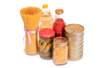 Food Reserves: Canned Food, Spaghetti, Pate, Tuna, Tomato Juice, Pasta, Fish and Grocery - Isolated on White Background. Emergency Food Storage in Case of Crisis. Strategic Food Supplies - Isolation