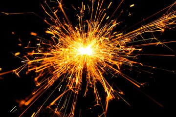 Sparkler spark. Firework spark or bengal light sparkler. New Year banner or Christmas background....