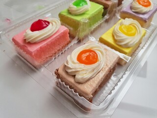 Assorted Mini cake delicious on take away packaging . Close up view of Mini cake delicious and beautiful