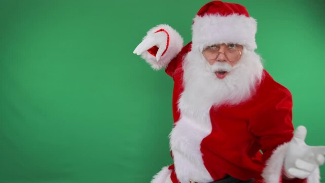 Santa gestures on green screen, perfect for interactive promos.