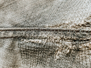 Jeans seam with old patch