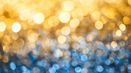 Fototapeta premium Abstract background with blurred circles of light in gold and blue tones.