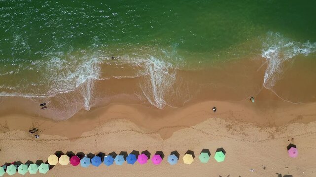 Aerial overhead shot capturing the waves along Icacos Beach in Acapulco, revealing the natural patterns in the water