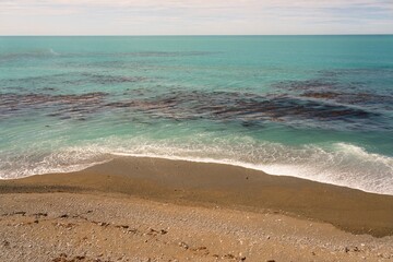 Waves Hitting Shore on Beautiful Turquoise Ocean