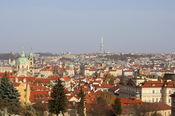view from the hill to the houses of the city center with red tiled roofs