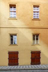 building facade with wooden floors and wooden windows