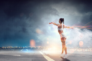 Young beautiful girl wearing fashion sports wear doing exercise