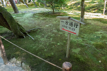 One way direction sign in the Japanese garden
