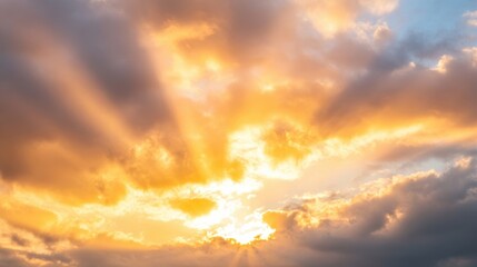 Fototapeta premium Sunlight streams through clouds during sunset, creating a stunning display of colors and rays that resemble golden gates in the sky
