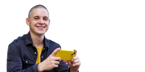 positive short-haired guy with a phone, isolated on a white background. a mobile phone user.