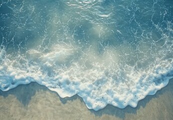 Obraz premium Serene Beach Waves Gently Lapping at Shoreline