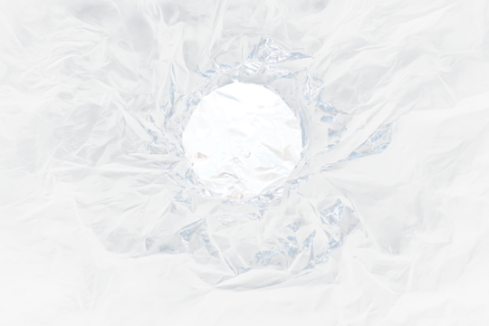 A hole in black plastic revealing a blue and white globe.