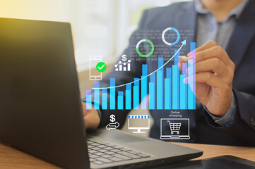  e-commerce growth concept. businessman drawing the graph of the online shopping sales volume  increase,