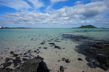 beautiful seascape with clear water and charming clouds