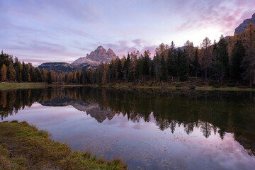 Fototapeta premium Stunning landscape and Tri Cime reflection of Antorno lake in autumn, Dolomite Italy.