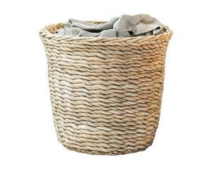 A woven basket filled with gray fabric, likely used for storage or laundry.