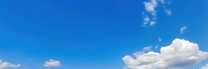 Obraz premium Peaceful blue sky background with fluffy white clouds, nature, clouds