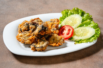Fried eel or belut goreng in Indonesian, is a popular dish made from freshwater eel that has been coated in a flavorful seasoning and fried until crispy