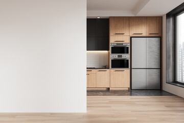 Obraz premium A modern kitchen with wooden cabinets and stainless appliances next to a blank wall. Ideal for interior design concepts. 3D Rendering