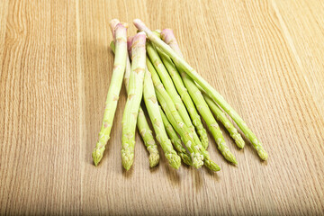 Raw green uncooked asparagus sprout