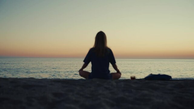Woman sunset meditation
