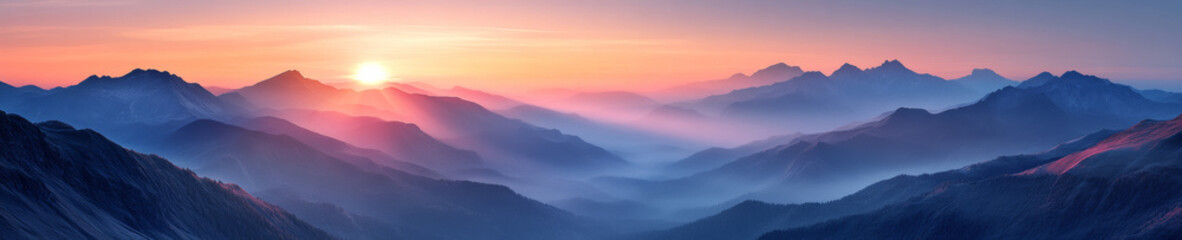 Obraz premium Breathtaking panoramic landscape of mountains at sunrise, showcasing vibrant colors and misty valleys. serene atmosphere evokes sense of tranquility and awe