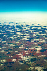 Looking from the window of plane at sunset