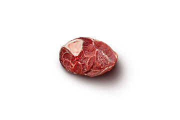 A raw lamb shank displayed on a plain white background, emphasizing its freshness and suitability for slow cooking or braising