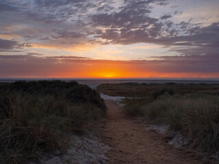 Sundown at Schiermonnikoog nature beach and sea in the Netherlands