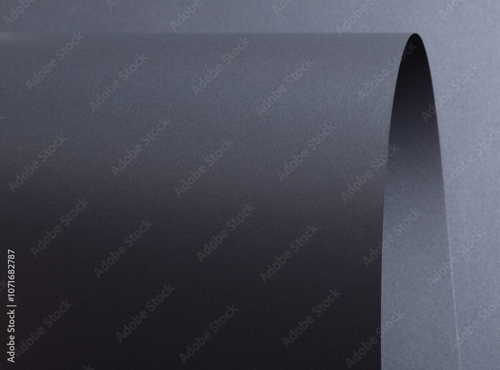 Aufkleber designer paper background with a dark gray, wavy texture and subtle gradient. featuring a crinkled, 