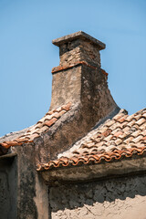 Old chimney, coastal village