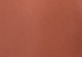 Designer paper background with a velvety, matte texture in warm earthy tones, blending shades of...