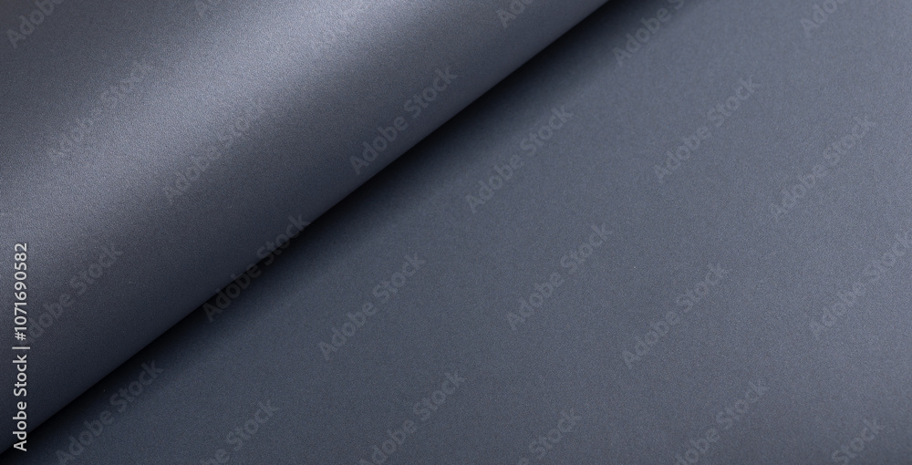 Poster Glossy designer paper background with a metallic slate gray gradient, featuring wavy, curved textures and a sleek, reflective surface. This dark, monochrome backdrop combines