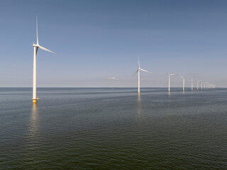 Windmills park in the sea near the coast of the flevopolder in the Netherlands