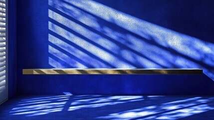 Sunlight streams through white shutters casting shadows on a blue wall and wooden shelf.
