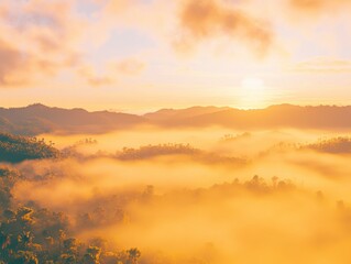 Fototapeta premium Golden Sunrise Over Misty Mountains