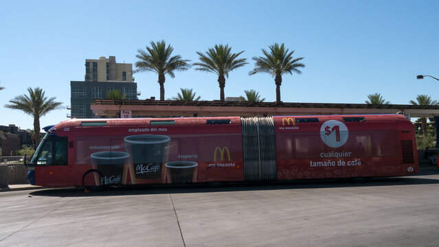 LAS VEGAS, NEVADA, USA - JUNE 04, 2013:   Articulated bus at Bonneville Transit Center with Spanish language adverts for McDonalds