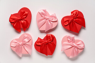 Gift boxes in shape of heart on white background. Valentine's Day celebration